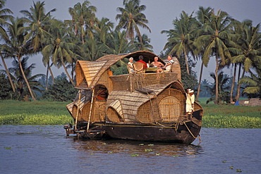 Tourists on a Kettuvallam houseboat, backwaters, channels, Kerala, coast of Malabar, southern India, India, Asia