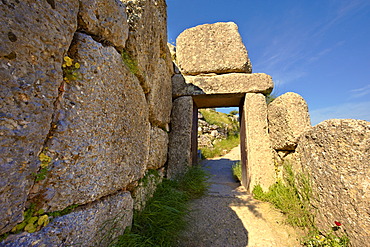 The North Postern gate, 1250 B.C., made from four monolithic blocks of "Almond Stone" in the typical form of two upright jams, a lintel over the top and threshold, Mycenae UNESCO World Heritage Archaeological Site, Peloponnese, Greece, Europe