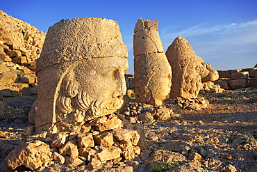 Broken statues around the tomb of Commagene King Antochius 1 on top of Mount Nemrut, Turkey