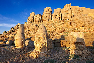 Broken statues around the tomb of Commagene King Antochius I on top of Mount Nemrut, Turkey