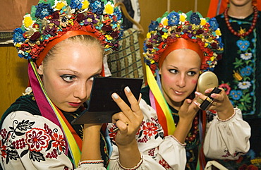 Two members of the folklore dance troupe "Bessarabskij Souvenir" putting on make-up before a performance at the Black Sea resort of Sergejewka, also known as Serhijivka, Ukraine, Eastern Europe, Europe