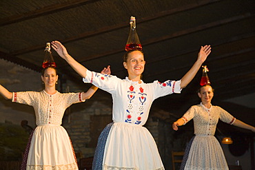 The folklore dance group "Domjan" is dancing in a Csarda, a traditional Hungarian tavern, Budapest, Hungary