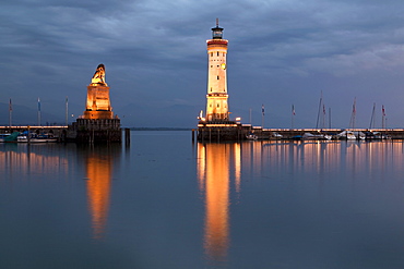 Harbour entrance with the lighthouse and the lion statue in the evening light, Lindau, Bavaria, Germany, Europe, PublicGround