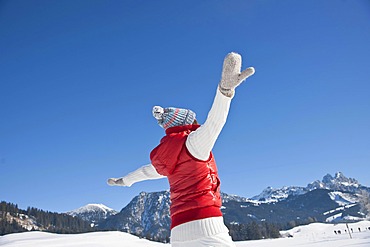 Woman dancing in the snow