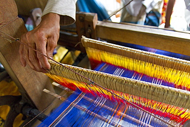 Hand at the loom, the establishment of the loom takes a day, 2300 threads have to be pulled twice by hand through eyelets, Batpara, Shahazadpur Upazila, Sirajganj, Bangladesh, South Asia, Asia