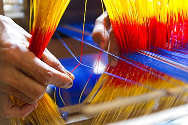 Hand at the loom, the establishment of the loom takes a day, 2300 threads have to be pulled twice by hand through eyelets, Batpara, Shahazadpur Upazila, Sirajganj, Bangladesh, South Asia, Asia