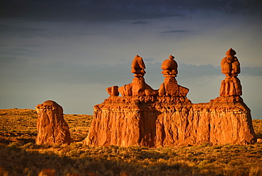 Three Sisters rock formations, thunderstorm, eroded entrada sandstone hoodoos and rock formations, Goblins, Goblin Valley State Park, San Rafael Reef Desert, Utah, Southwestern USA, USA