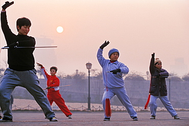 Women practising Tai Chi at dawn in Shanghai, China, Asia