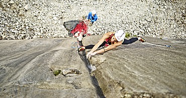 Woman lead climbing a gully, crack in the rock, Martinswand climbing area, Zirl, Tyrol, Austria, Europe