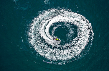 Aerial view, jetski, jetskier performing a circle, off Leucate, Le BarcarÃ¨s, Languedoc-Roussillon, France, Europe