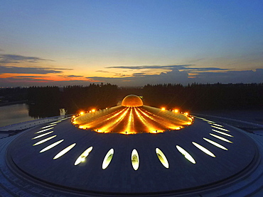 Phra Mongkol Thepmuni Memorial Hall, illuminated golden dome of the Phramonkolthepmuni meditation hall, Khlong Luang District, Pathum Thani, Bangkok, Thailand, Asia (Drone)