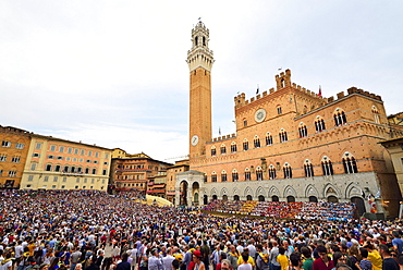 Piazza del Campo with Palazzo Publico on a training day of the Palio di Siena, Siena, Tuscany, Italy, Europe