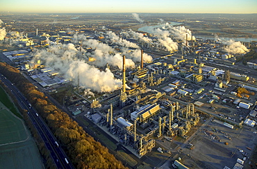 Chempark Dormagen with steaming chimneys in the morning light, production, research and services companies, chemical industry, Cologne, Rhineland, North Rhine-Westphalia, Germany, Europe