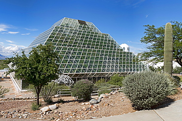 Biosphere 2, self-sustaining ecosystem, cactus in front of facility with tropical rainforest, Oracle, Arizona, USA, North America