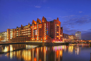 International Maritime Museum Hamburg in the former Kaispeicher I at dusk, Speicherstadt, Hafencity, Hamburg, Germany, Europe