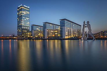 Treptowers and Molecule Men monument in the river Spree during blue hour, Berlin-Treptow, Berlin, Germany, Europe