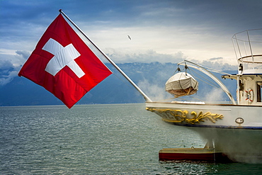 La Suisse paddle steamer on Lake Geneva with Swiss flag, Canton of Vaud, Switzerland, Europe