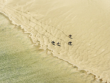 Rusheen Bay, horse riders on sandy beach, Galway, County Clare, Ireland, Europe