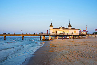 Beach with Ahlbeck pier in evening light, seaside resort Ahlbeck, Usedom Island, Mecklenburg-Western Pomerania, Germany, Europe