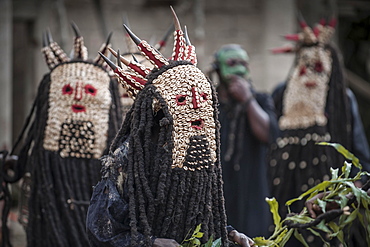 Men of the ethnic group of the Bamileke with traditional masks, Dance of Death in honor of a deceased person, Badenkop, West Region, Cameroon, Africa