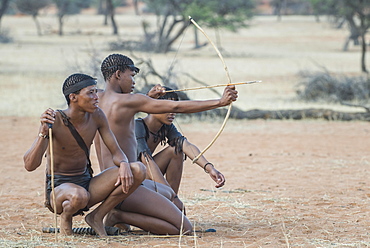 Kung Bushmen with bow and arrow, Zebra Lodge, Hardap Region, Namibia, Africa