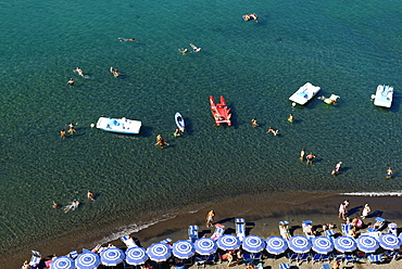 Tourists, bathers on the beach with sunshades, bird's eye view, Sorrento, Sorrentine Peninsula, Amalfi Coast, Campania, Italy, Europe