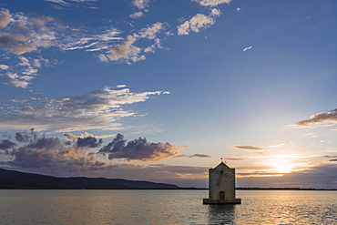 Spanish Windmill in lagoon, sunset, Orbetello, Tuscany, Italy, Europe