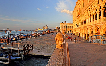 Piazzetta with Doge's Palace, in the back church of Santa Maria della Salute, morning atmosphere, Venice, Italy, Europe