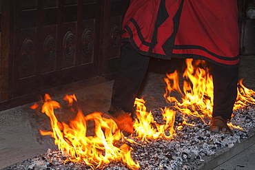 Firewalking, man running barefoot on hot coals, Kandy, Central Province, Sri Lanka, Asia