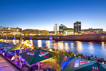 Beach bar Capital Beach at dusk at the river Spree opposite central railway station, Berlin-Mitte, Berlin, Germany, Europe