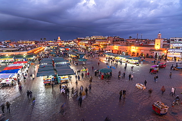 Djemaa el Fnaa market square at dusk, Marrakech, Morocco, Africa