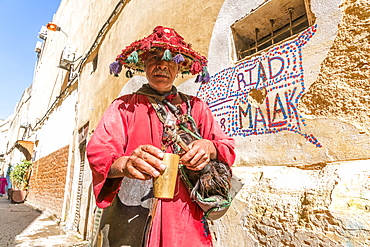 Traditional water seller in the Medina, Fez, Morocco, Africa