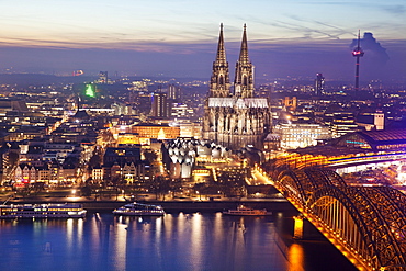 Cityscape with Cologne Cathedral, Hohenzollern Bridge and the Rhine at dusk, Cologne, Rhineland, North Rhine-Westphalia, Germany, Europe