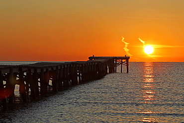 Sunrise at a jetty leading out into the sea, Alcudia, Majorca, Balearic Islands, Spain, Europe