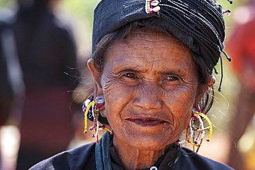 Native woman in typical clothing and headgear from the Ann tribe in a mountain village at Pin Tauk, portrait, Shan State Golden Triangle, Myanmar, Asia