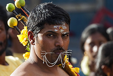 Local man at a Hindu festival, portrait, near Mahebourg, Mauritius, Africa