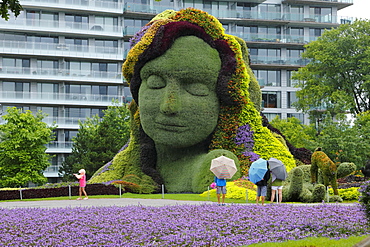 Plant sculpture Mother Earth with modern building behind, Gatineau, Quebec Province, Canada, North America