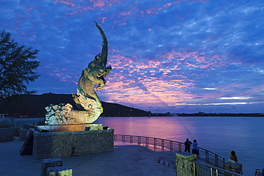 Dragon fountain at dusk on the promenade in Songkhla, Thailand, Asia