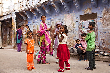 Children in the blue painted historic centre, Jodhpur, Rajasthan, India, Asia