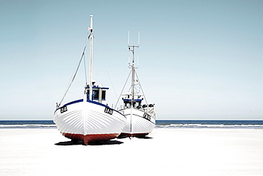 Fishing boats lying in the sand, on the beach, Jutland, Denmark, Europe