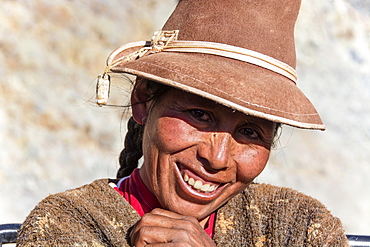 Indigenous woman with hat, laughing, Cusco, Peru, South America