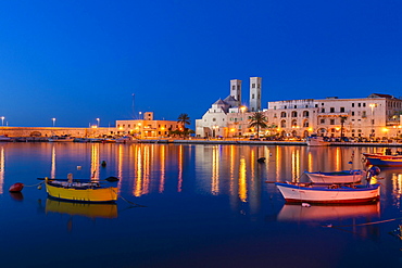 Blue Hour, dusk, fishing boats, harbour, historic centre, with the Romanesque Duomo Vecchio, old cathedral, San Corrado, Molfetta, Bari Province, Apulia, Italy, Europe