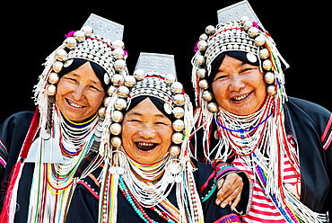 Akha hill tribe women in traditional dress, northern Thailand