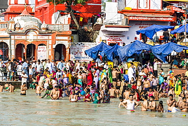 Masses of pilgrims are gathering for bathing at Harki Pauri Ghat at the holy river Ganges, Haridwar, Uttarakhand, India, Asia