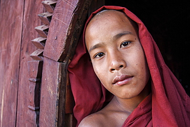 Novice monk in the Shwe Yaunghwe Kyaung Monastery, near Nyaungshwe, Shan State, Inle Lake, Myanmar, Asia