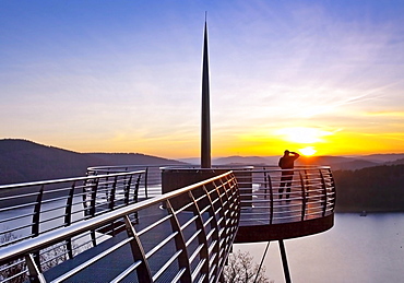 Viewing platform Biggeblick with a person at sunset, Biggesee reservoir, Attendorn, Sauerland, North Rhine-Westphalia, Germany, Europe