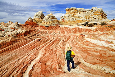 Hiker in White Pocket Canyon, Kanab, Utah, USA, North America