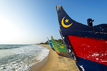 Colorful fishing boats on the beach, Varkala, Kerala, India, Asia