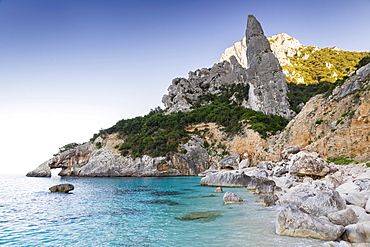 Punta Caroddi pinnacle in Cala Goloritze bay, in the evening light, Golfo di Orosei, Golfo di Orosei und Gennargentu National Park, Sardinia, Italy, Europe