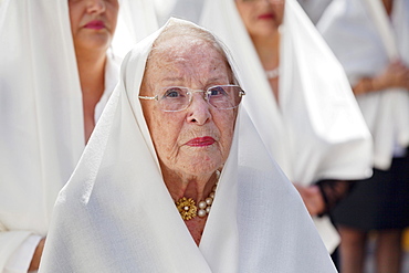 Mature woman taking part in the Easter procession in the historic centre of Vegueta, Las Palmas, Gran Canaria, Canary Islands, Spain, Europe